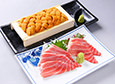 Raw sea urchin and fatty tuna sashimi assortment